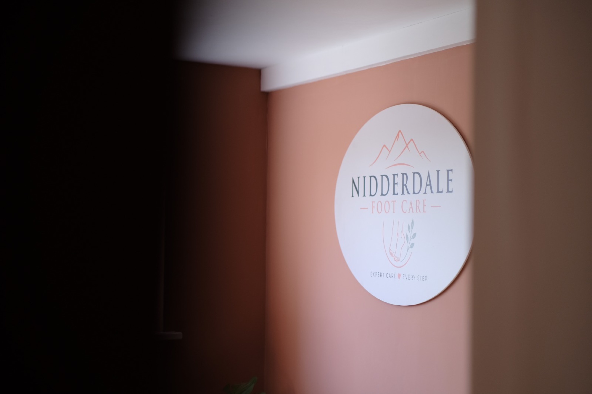 Nidderdale Foot Care logo on the wall